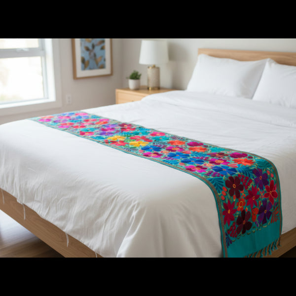 Traditional Oaxaca colorful floral bed runner on a queen size bed