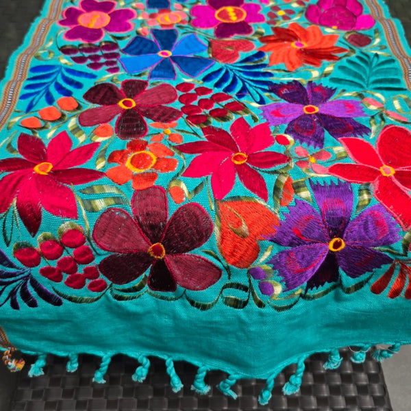 Colorful floral table runner Oaxaca Mexico