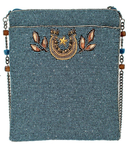A detailed image of the back side of the Spirited crossbody handbag by Mary Frances.